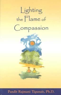 lighting the flame of compassion by Pandit Rajmani Tigunait Phd